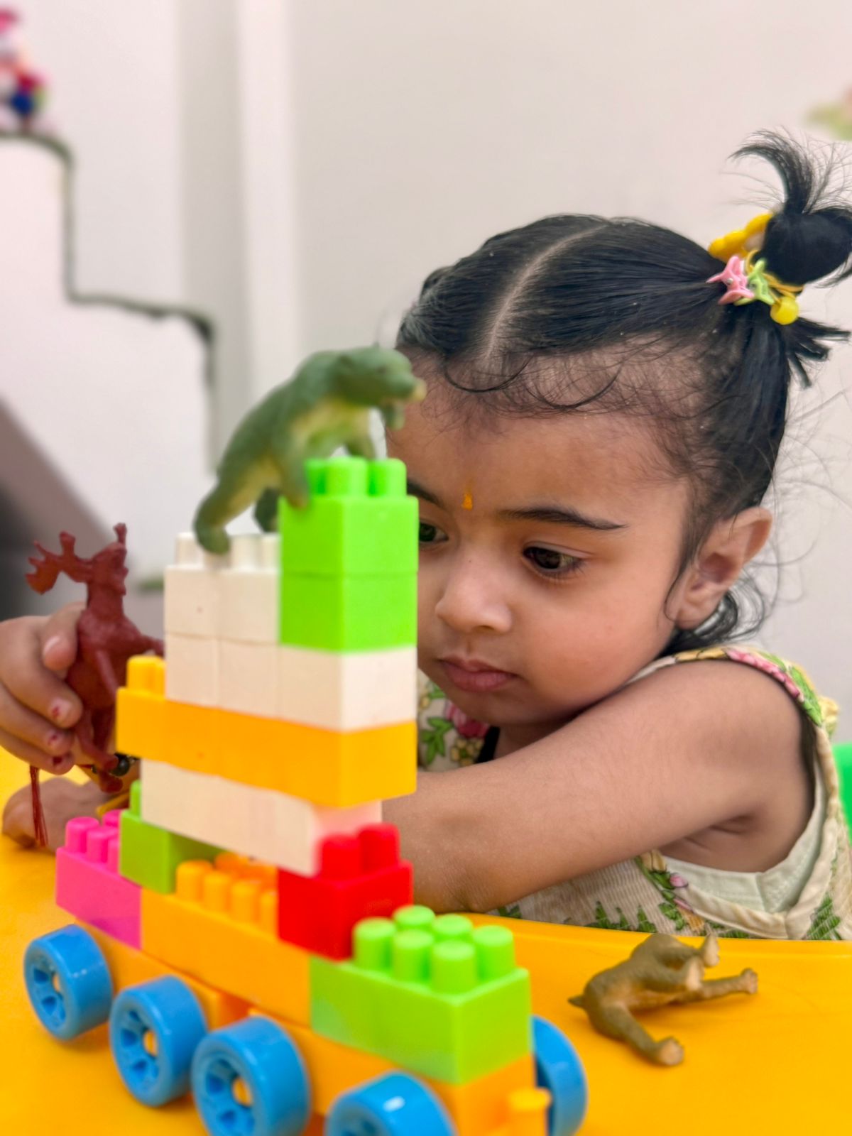 Children enjoying an activity at Little Champs Playway